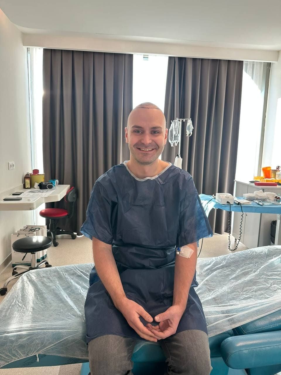 A man getting ready for hair transplant procedure